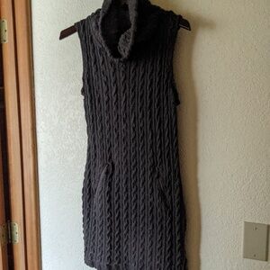 Cable-knit charcoal + zip pockets; Cotton blend